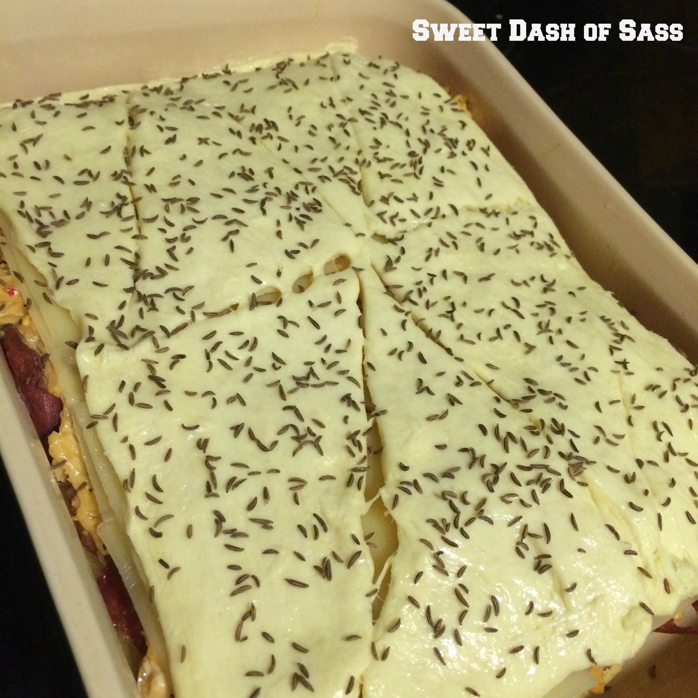 Reuben Crecent Sandwich Bake - www.SweetDashofSass.com  -- If you are a fan of Reubens, you will love this meal!!!