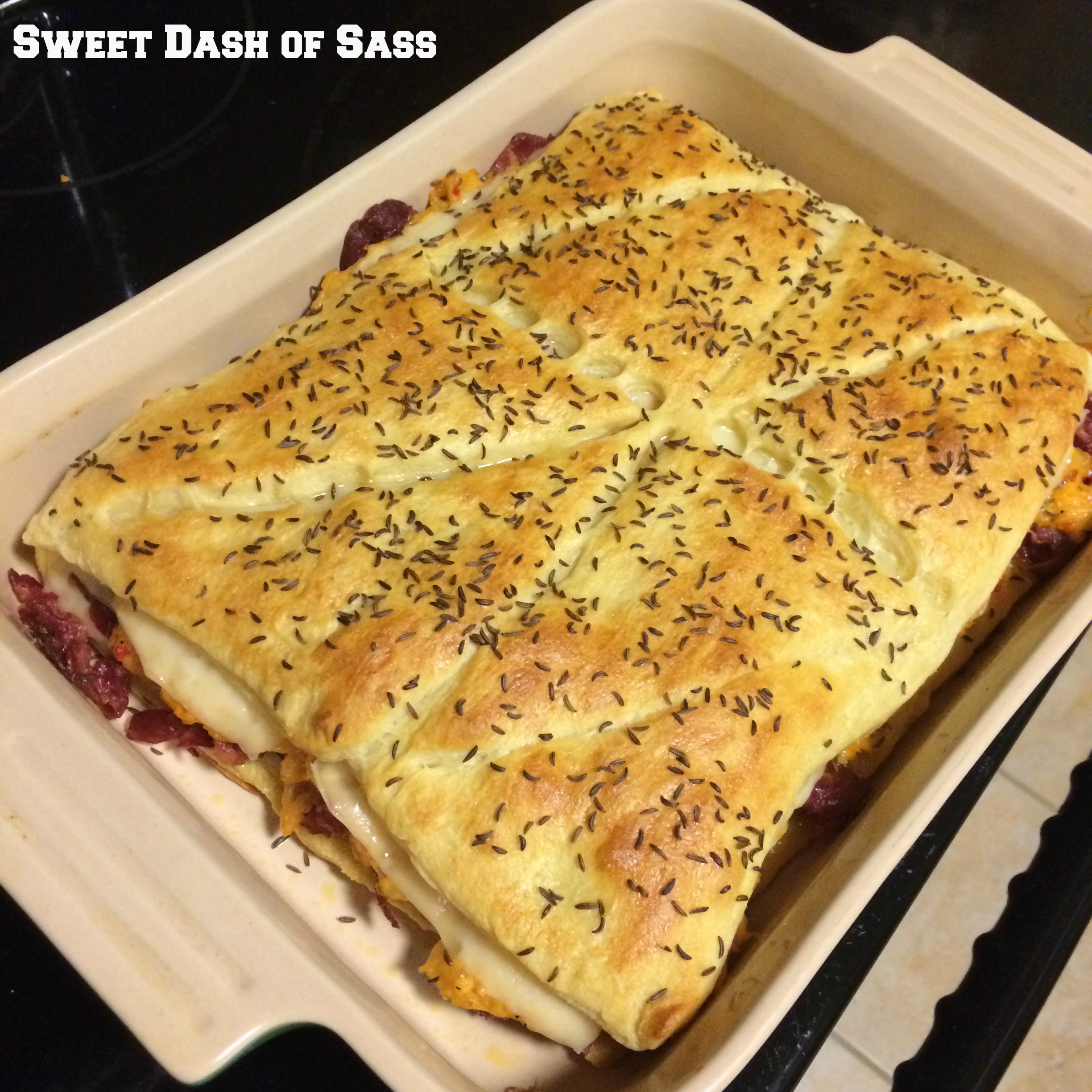Reuben Crecent Sandwich Bake - www.SweetDashofSass.com  -- If you are a fan of Reubens, you will love this meal!!!